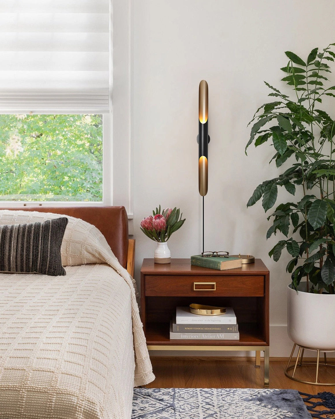 Pair of Coltrane wall lamps in master bedroom, dual sconces for ambient lighting