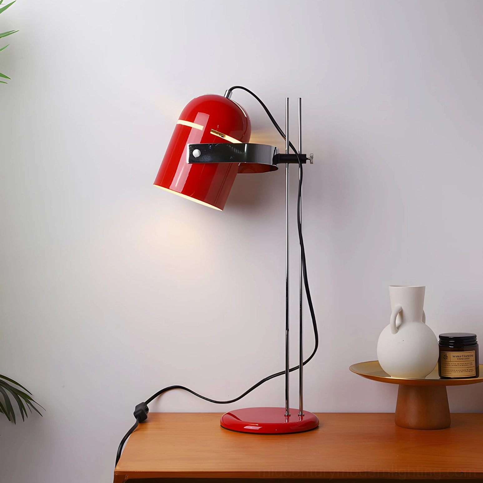 Red adjustable lamp wooden tabletop mid-century modern styling
