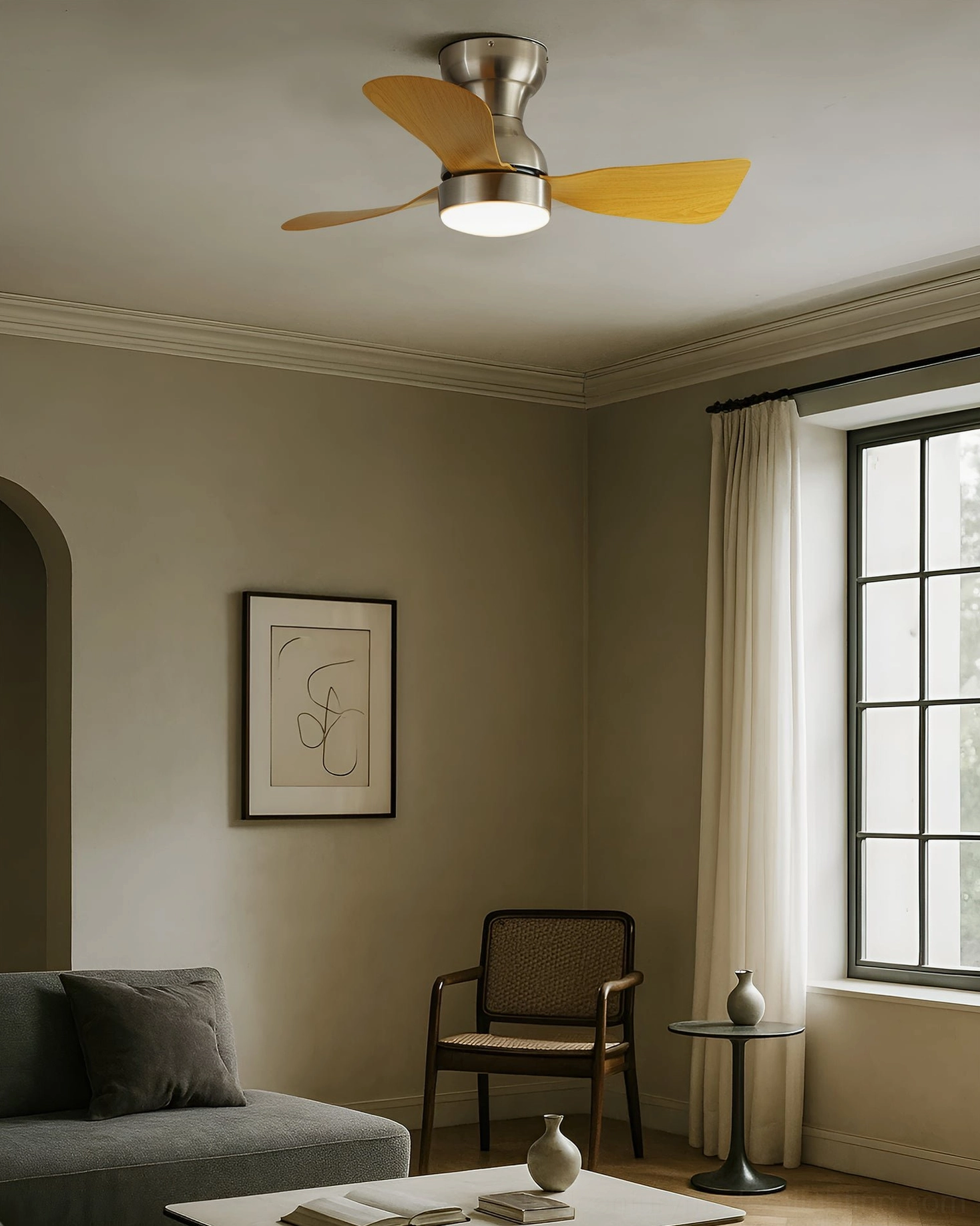 Compact modern ceiling fan light with integrated LED in minimalist living room setting, light wood grain blades in contemporary home décor