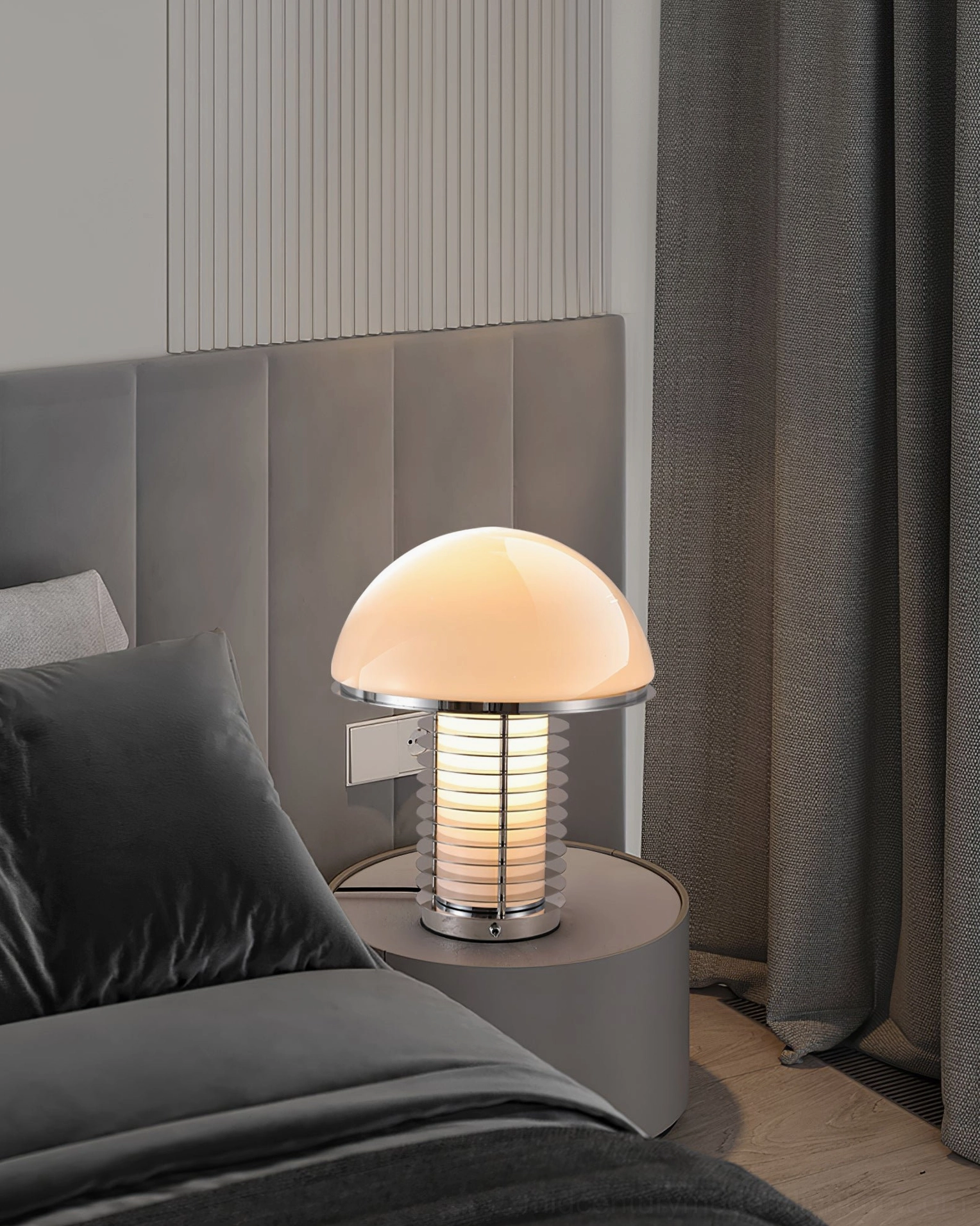 Compact mushroom table lamp in chrome finish demonstrating space-saving mid-century modern design