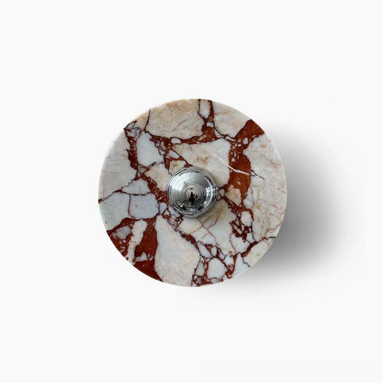 Compact red marble wall lamp with chrome accent hardware demonstrating smaller installation size