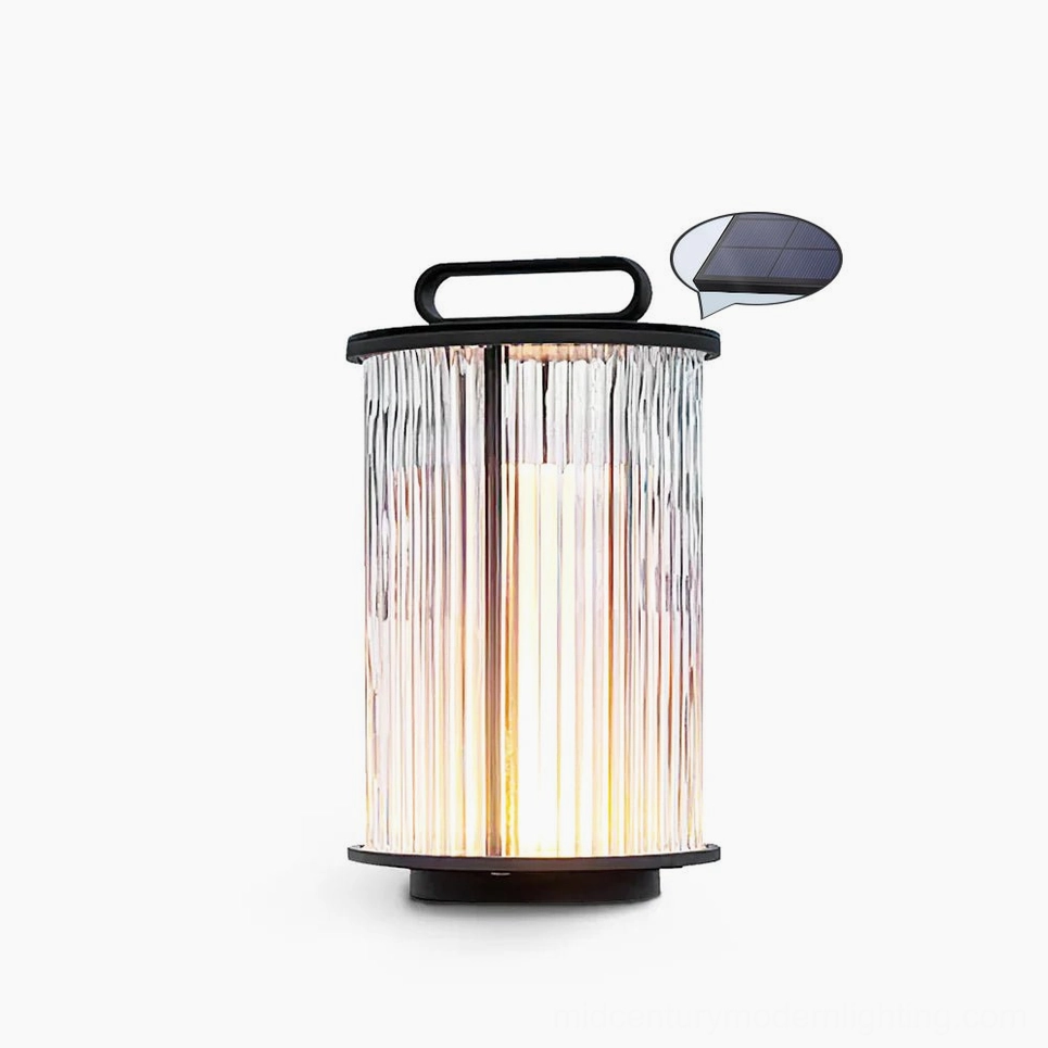 Compact 20cm solar glass lantern table lamp in black and clear with warm light