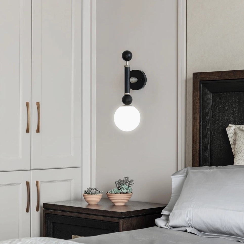 Complete globe wall sconce product view showing proportions and mid-century modern aesthetic