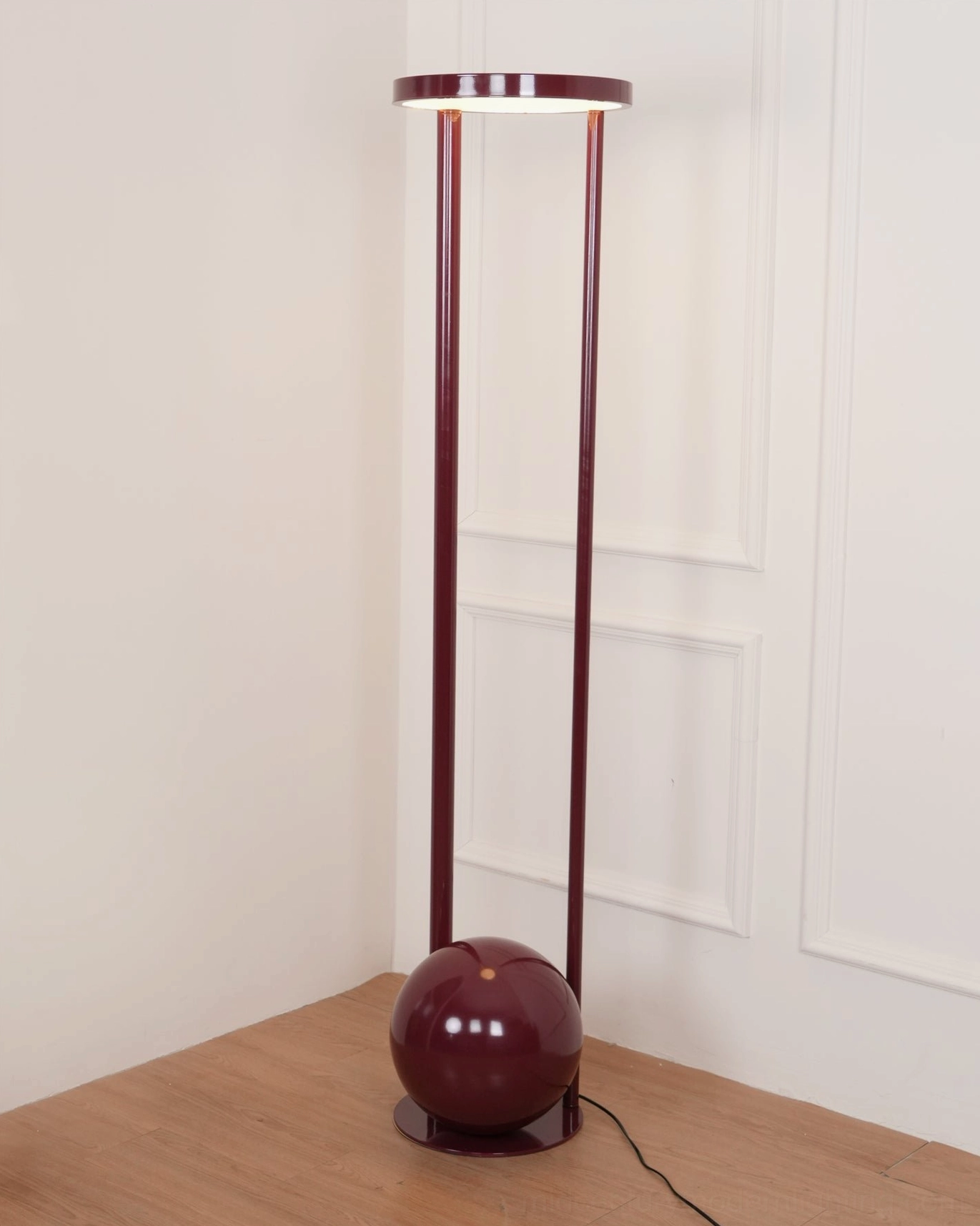 Composition floor lamp design detail and structural view - cylindrical metal support with spherical base in mid-century modern aesthetic