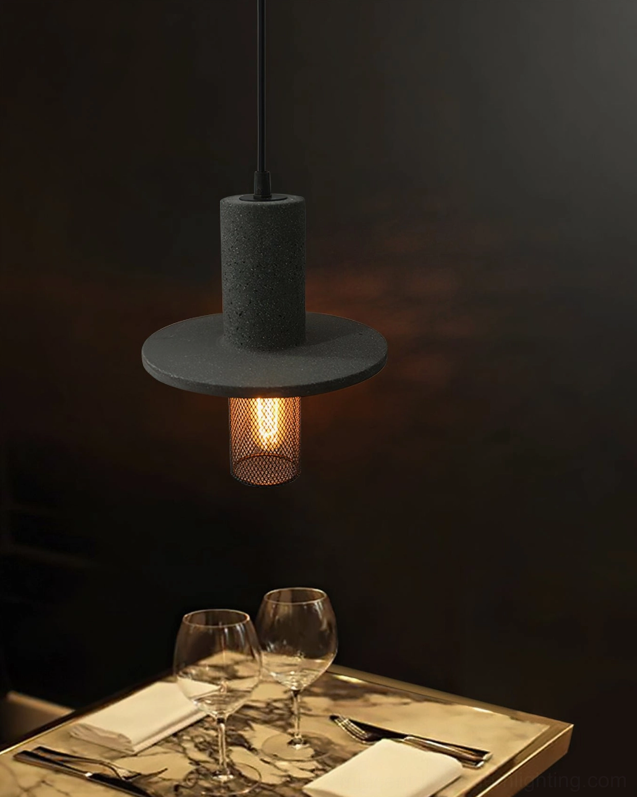 Condo pendant light suspended above dining table at low angle showing restaurant setup coordination with tableware and place settings