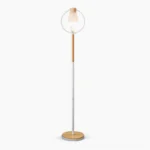 Cone arc floor lamp with frosted glass shade and wooden base in minimalist Nordic living room setting