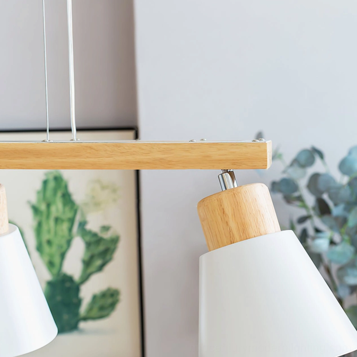 Pendant chandelier rod and E26 bulb holder connection detail in minimalist home setting