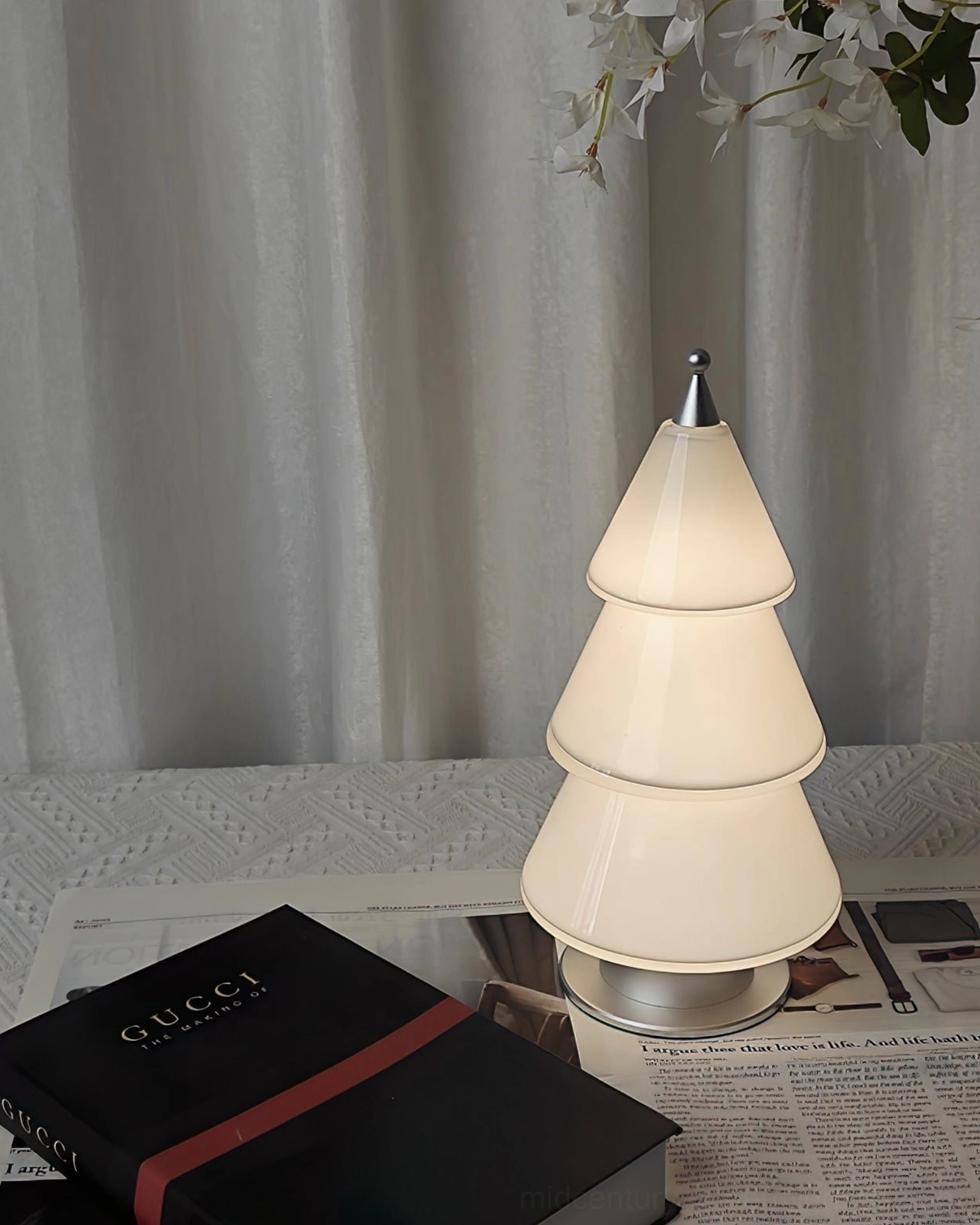 Geometric tiered cone table lamp with integrated LED battery technology and touch control functionality