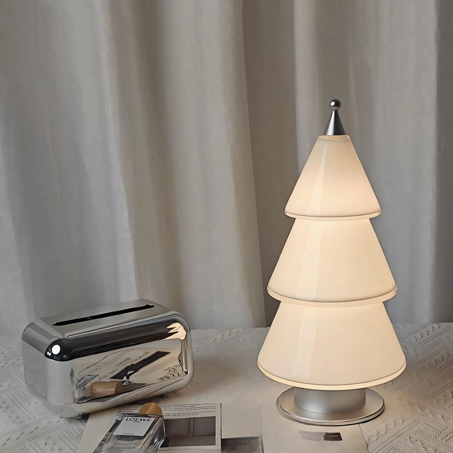 Tiered cone LED table lamp paired with matching silver metal tissue box creating coordinated home décor set