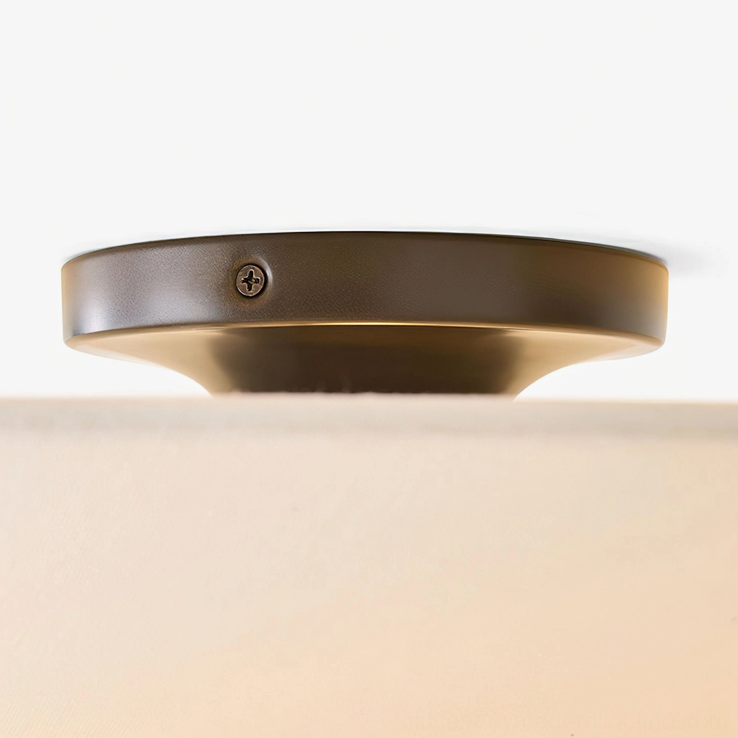 Cono lamp ceiling mount base dark bronze metal hardware close-up detail fixture