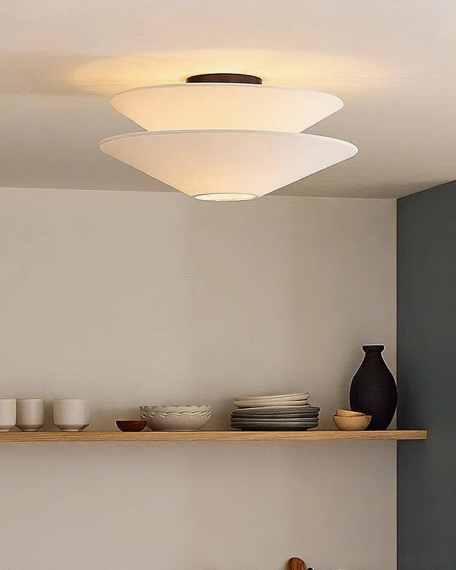 Cono conical ceiling lamp close-up overhead view minimalist interior wooden shelf neutral decor