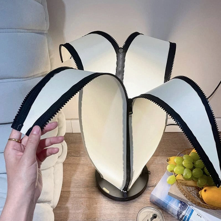 Contemporary banana desk lamp in minimalist monochrome black and white color palette