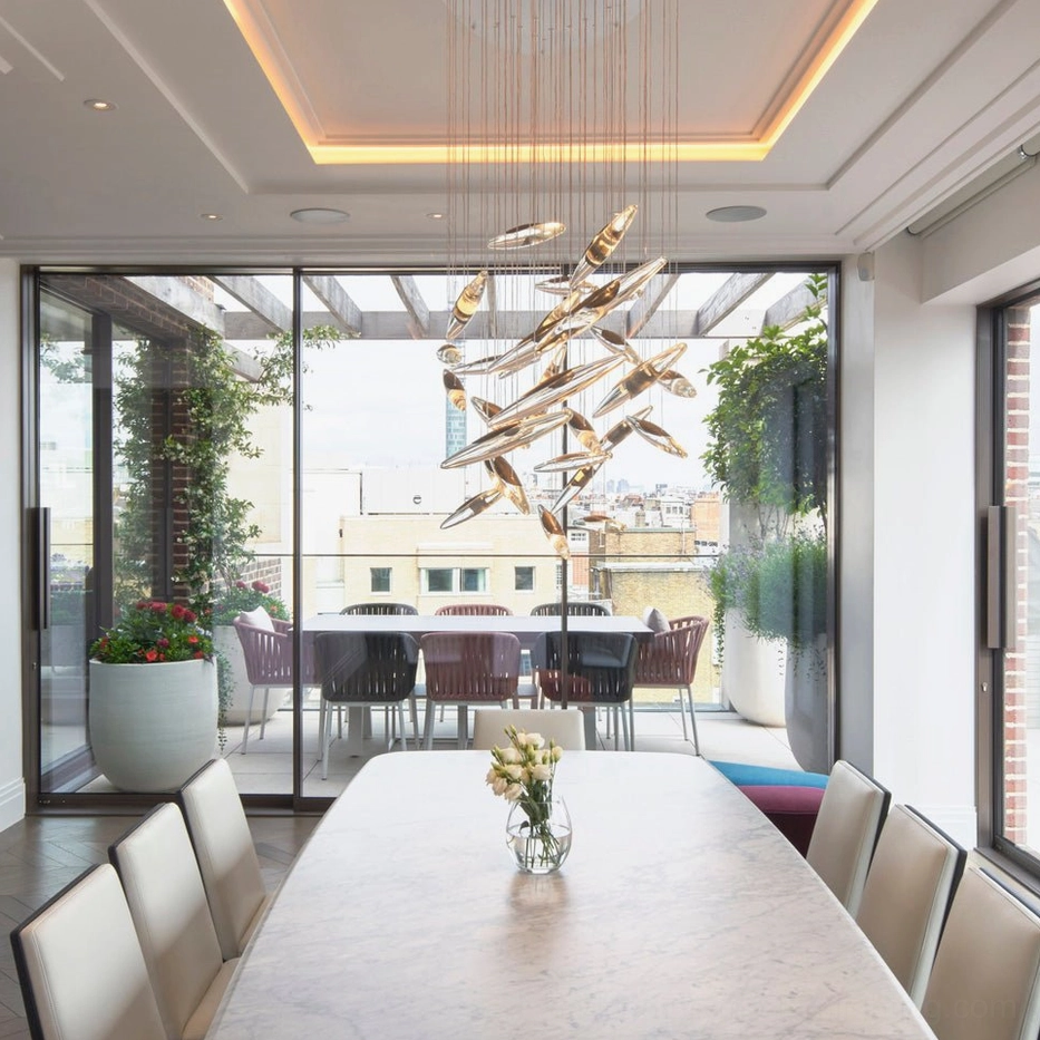 Contemporary cascading chandelier installation showing architectural lighting design and spatial presence