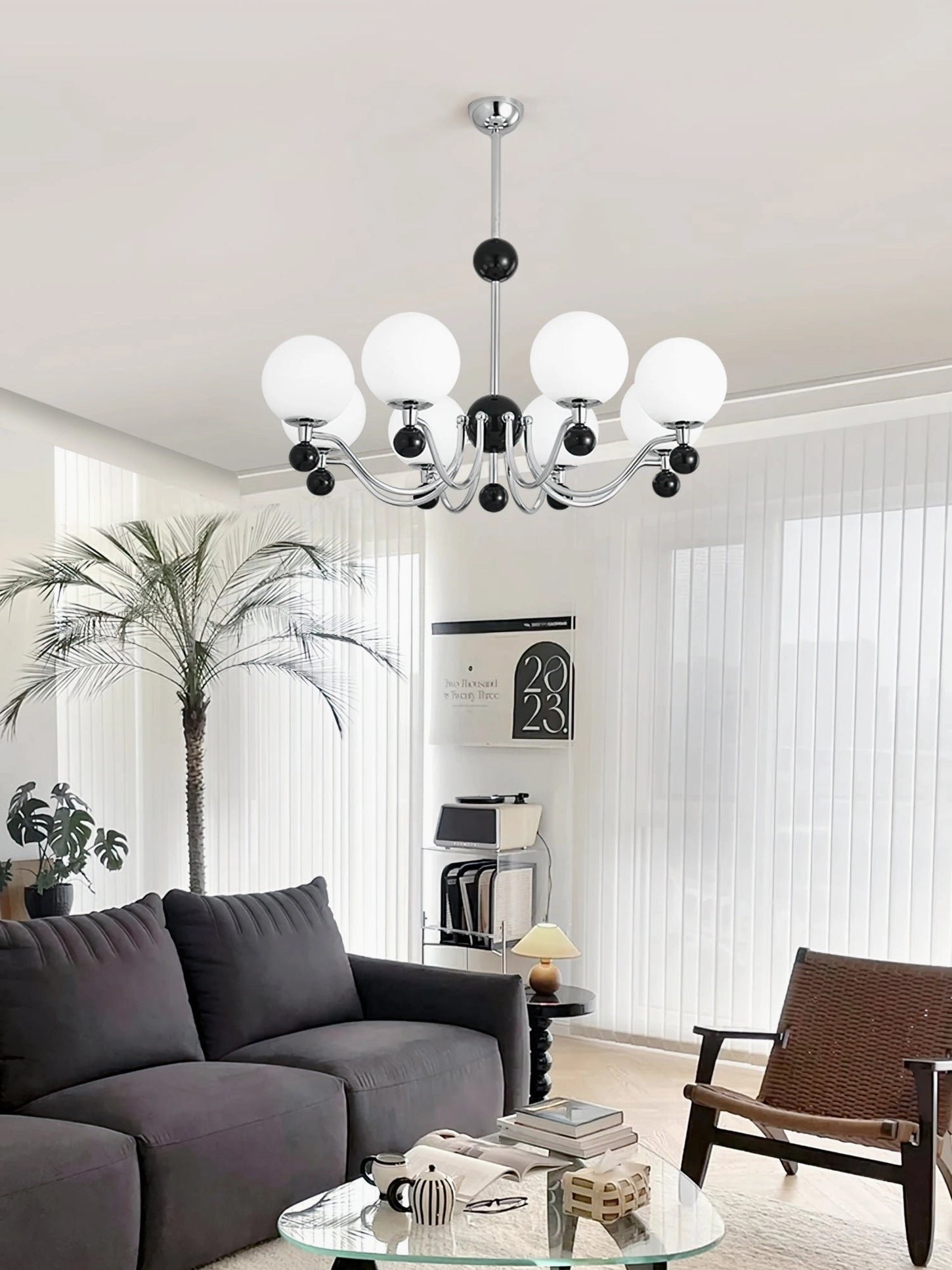 Contemporary spherical chandelier providing ambient lighting in dark-toned modern living space