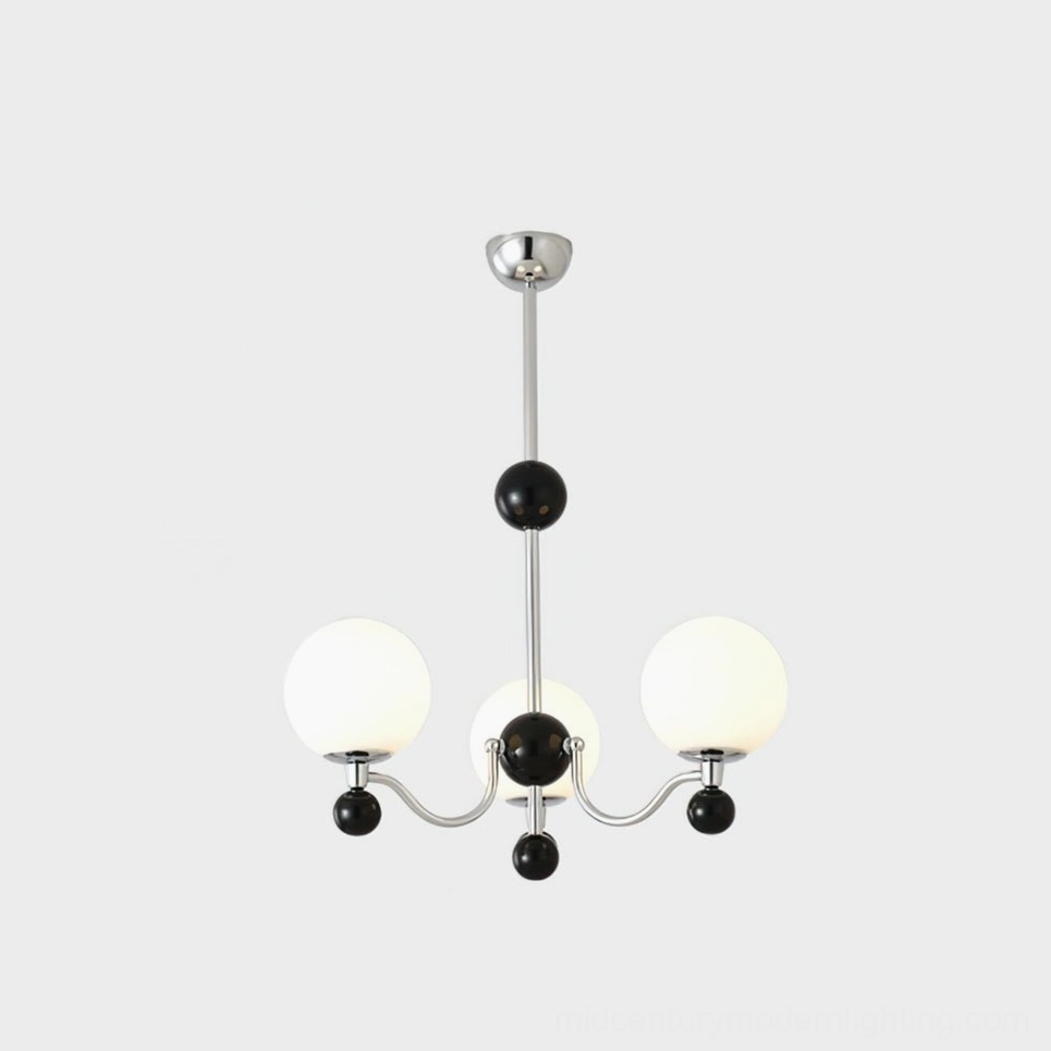 Modern spherical chrome chandelier with black decorative accents contemporary interior design