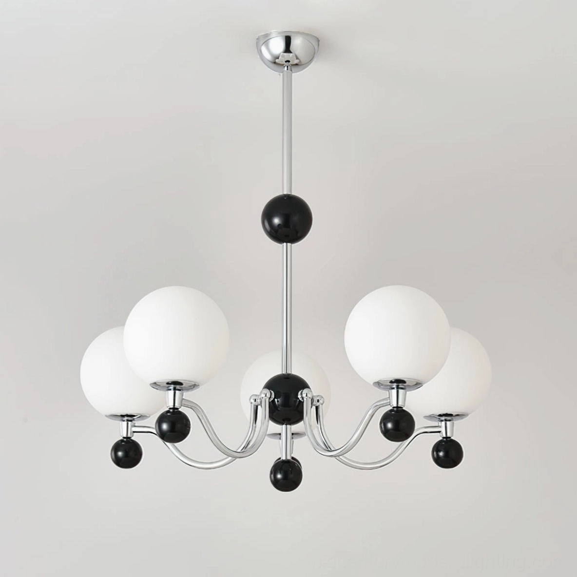 Contemporary chrome chandelier with multiple frosted glass shades in open concept living area