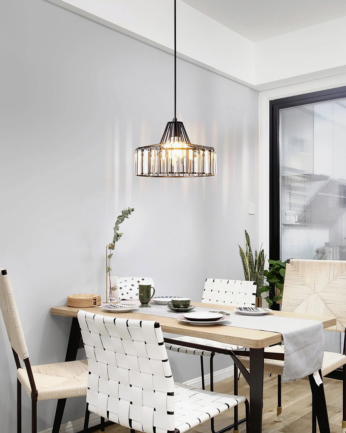 Contemporary crystal pendant lamp with adjustable suspension creating ambient dining light