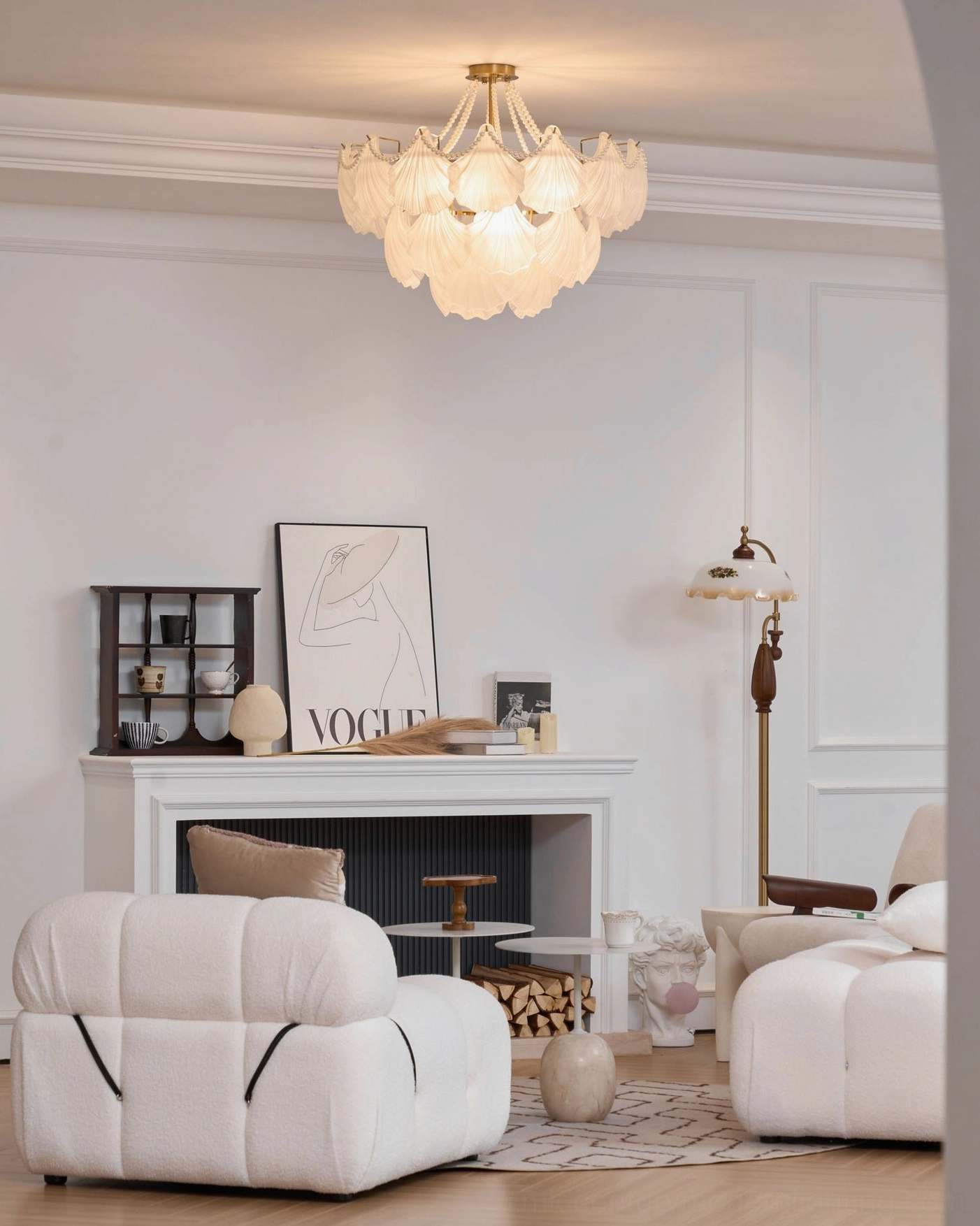 Contemporary dining room featuring large scallop shell glass chandelier with multiple bulbs and warm lighting