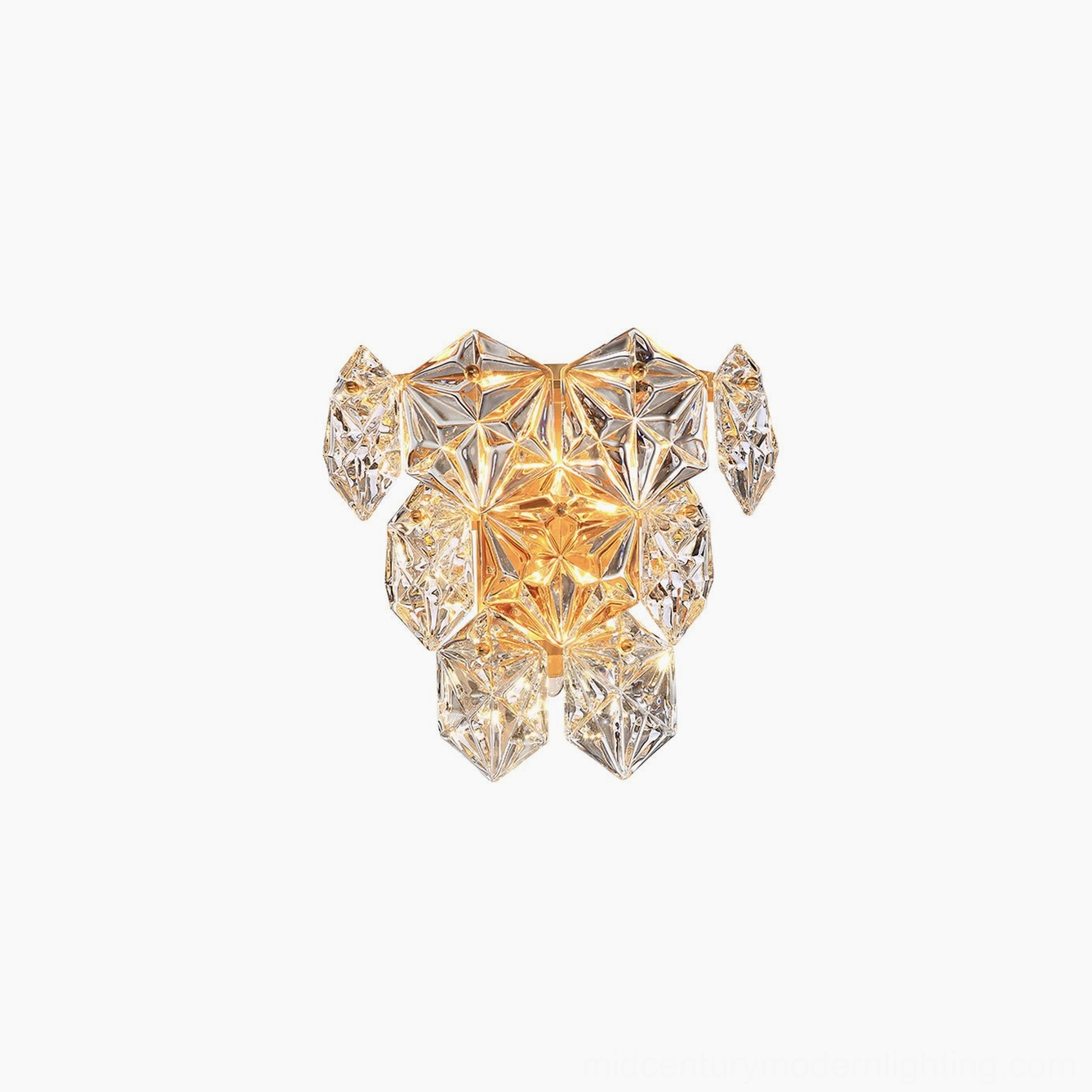 Contemporary faceted crystal wall sconce creating ambient lighting in modern interior space