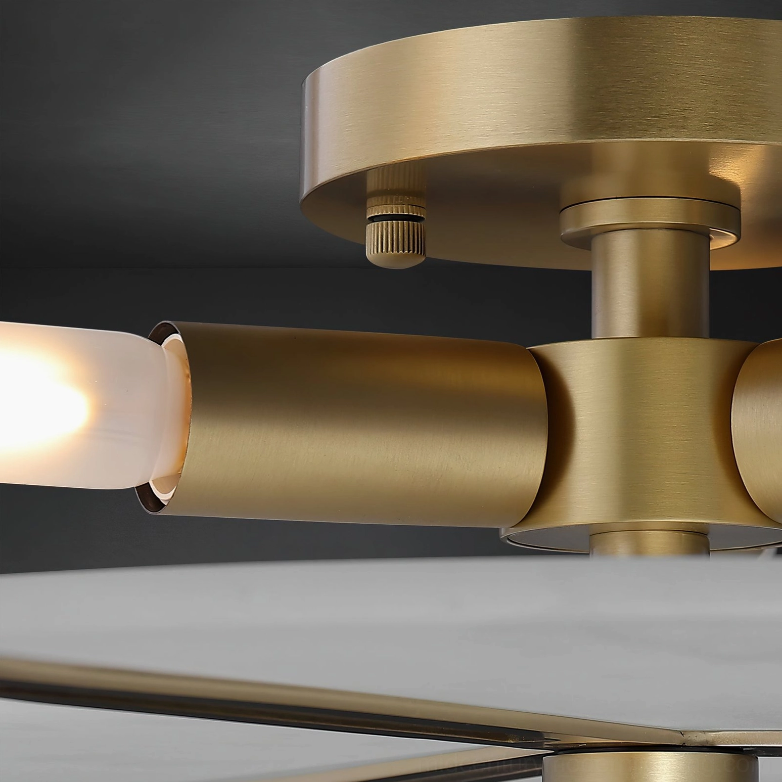 Contemporary flush mount ceiling lamp with brass finish and frosted glass