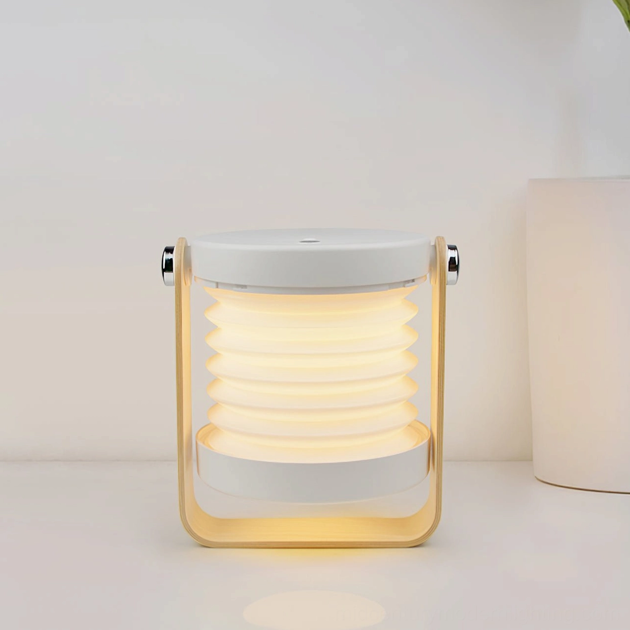 Contemporary lantern table lamp with honeycomb structure, compact size ideal for bedroom and home office spaces