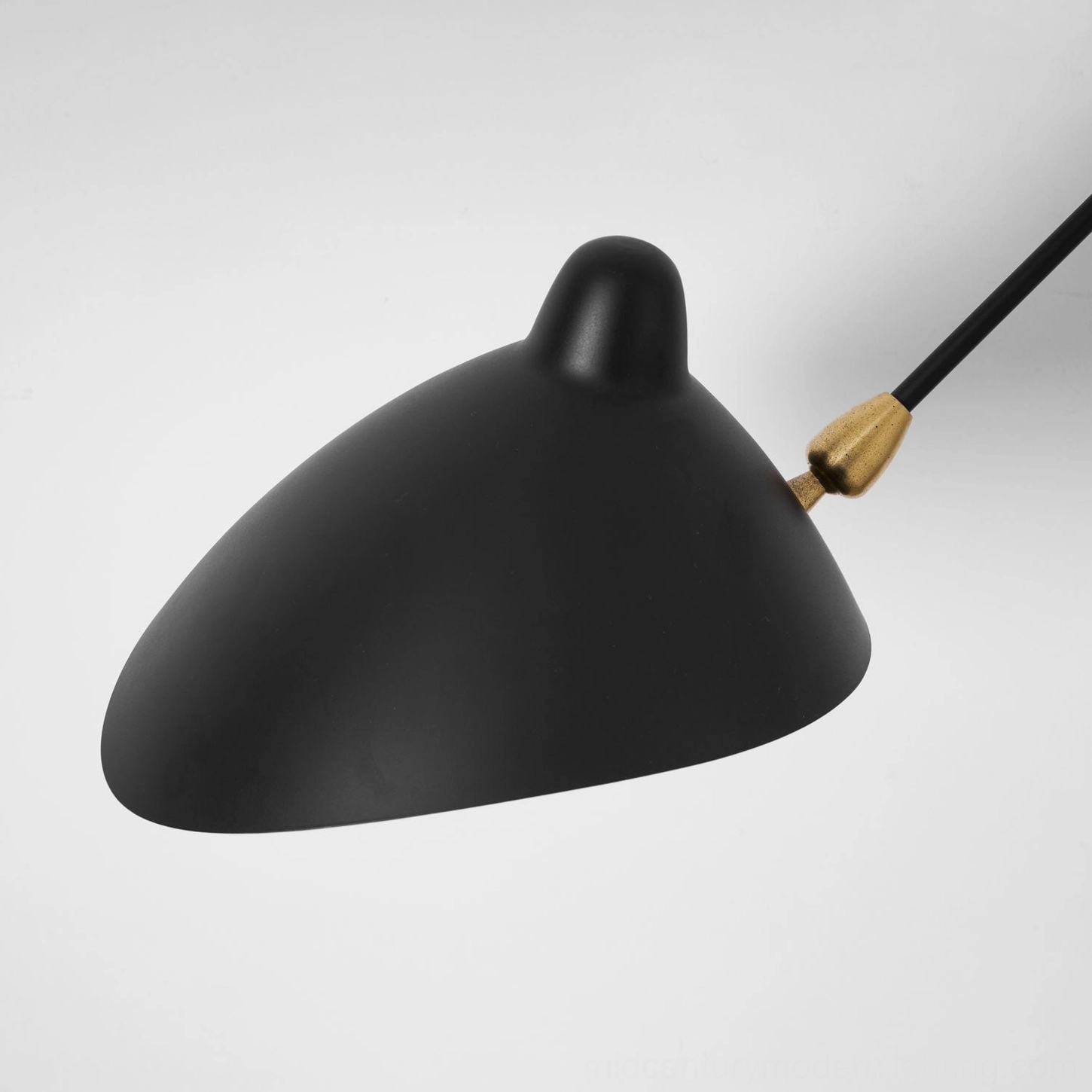 Contemporary mid-century modern spider sconce with aluminum arms and brass fixtures