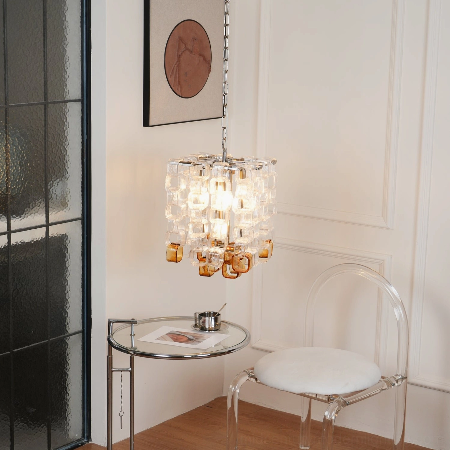 Contemporary Murano-style glass chandelier demonstrating geometric cube design and light diffusion through layered glass blocks