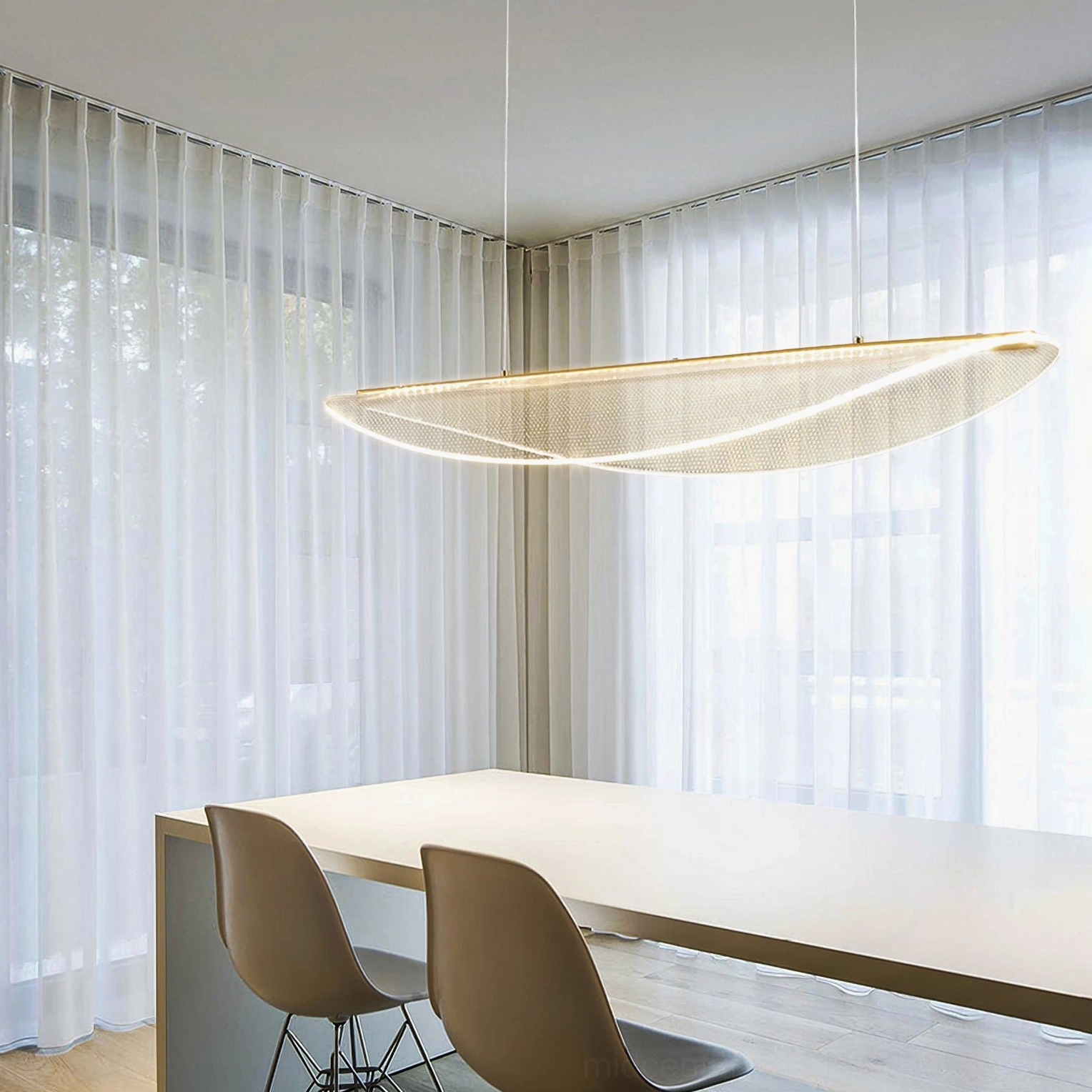 Contemporary pendant light installation in sophisticated dining and living space