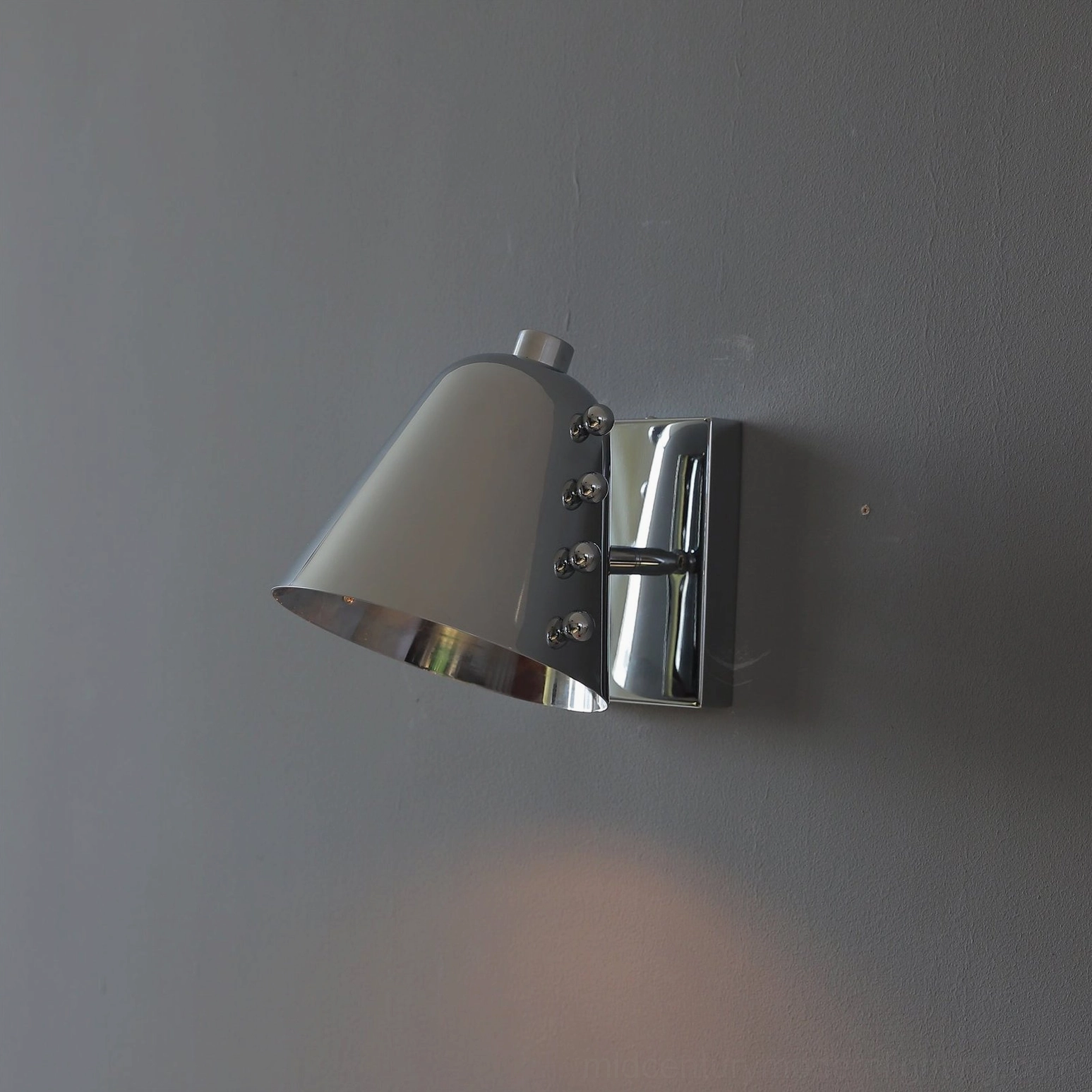 Contemporary wall sconce in architectural interior design showcase modern lighting feature