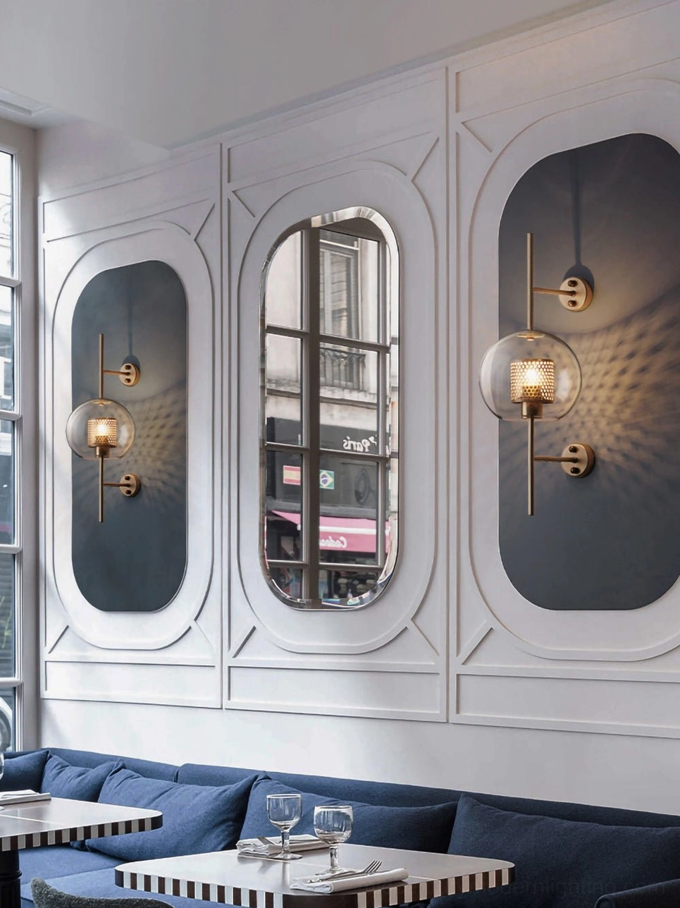 Contemporary glass sconce mounted on wall showing installation positioning