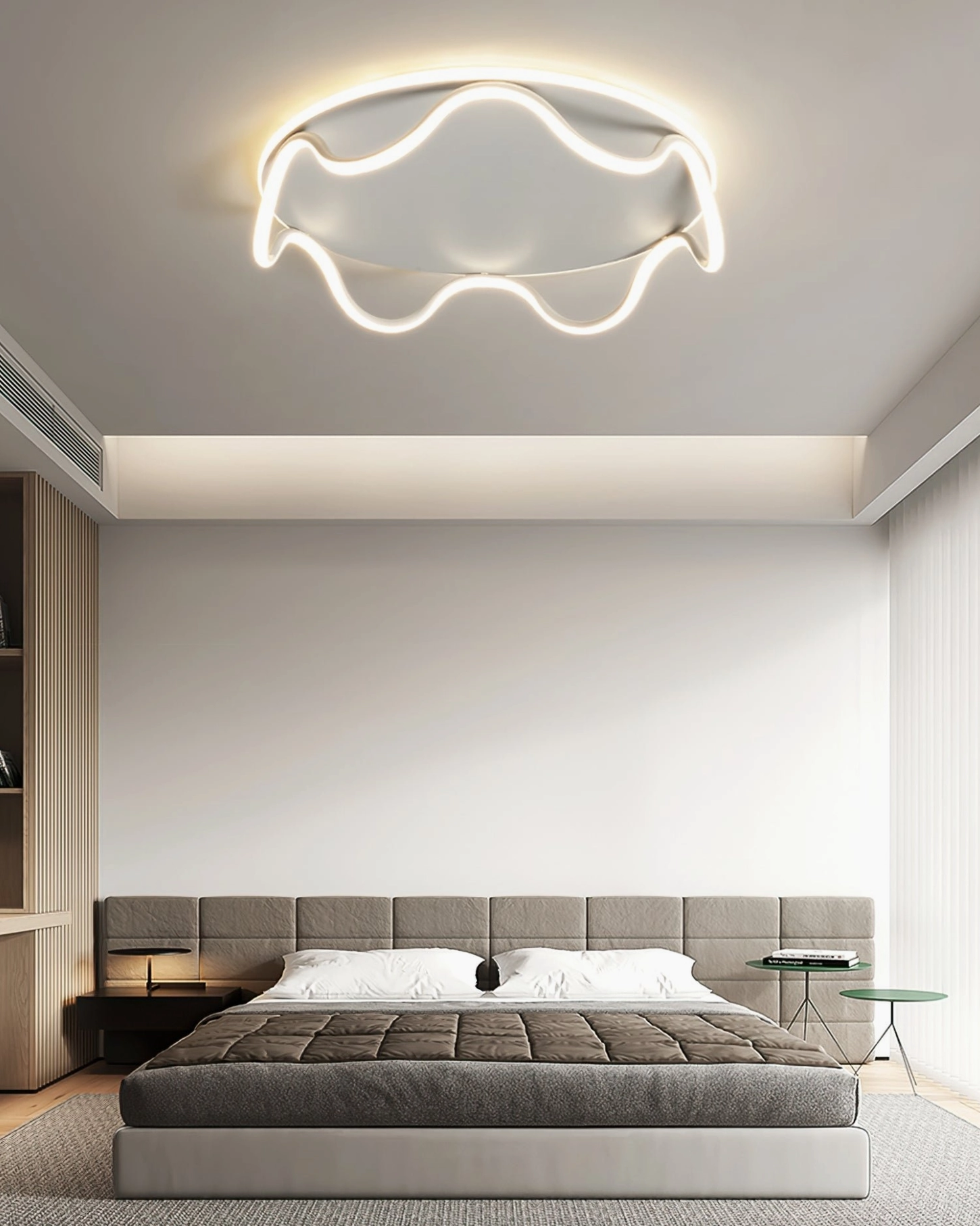 Upward ceiling view of contemporary wavy LED light fixture in bedroom with integrated study desk and indoor plant