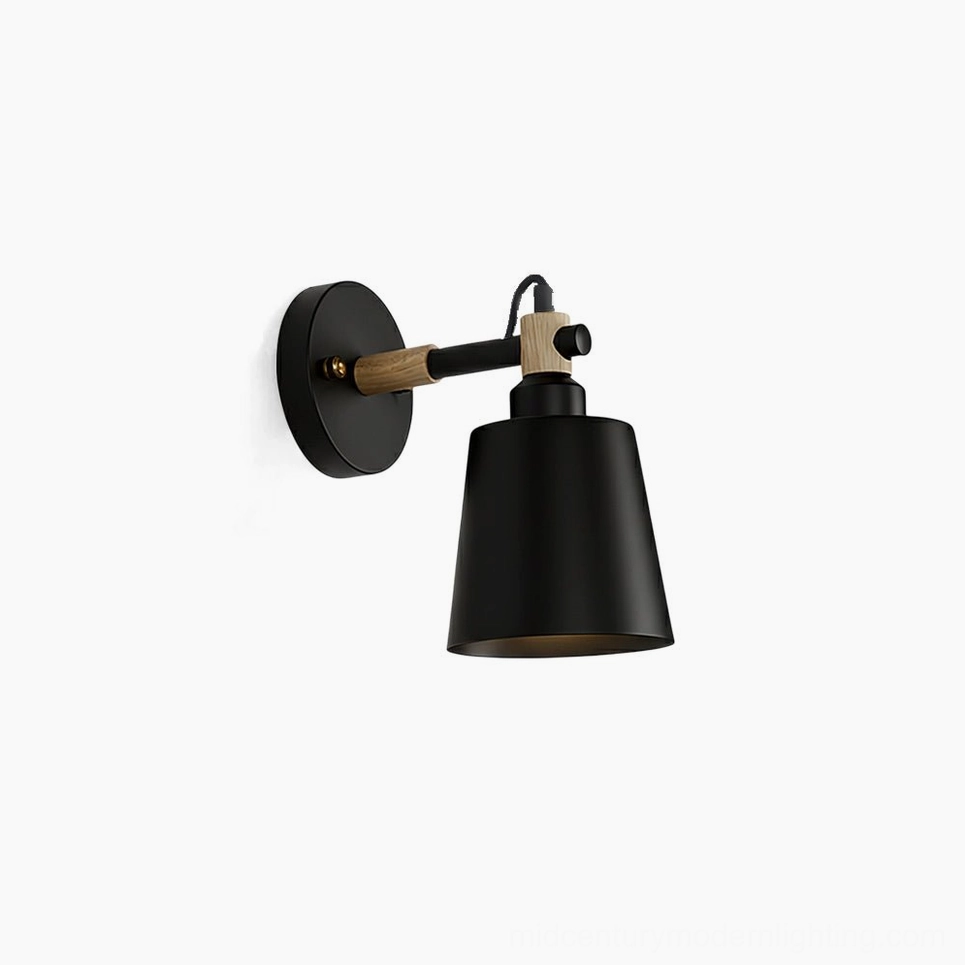 Copita adjustable wall lamp front view with matte black metal shade and natural wood accents on pure white background