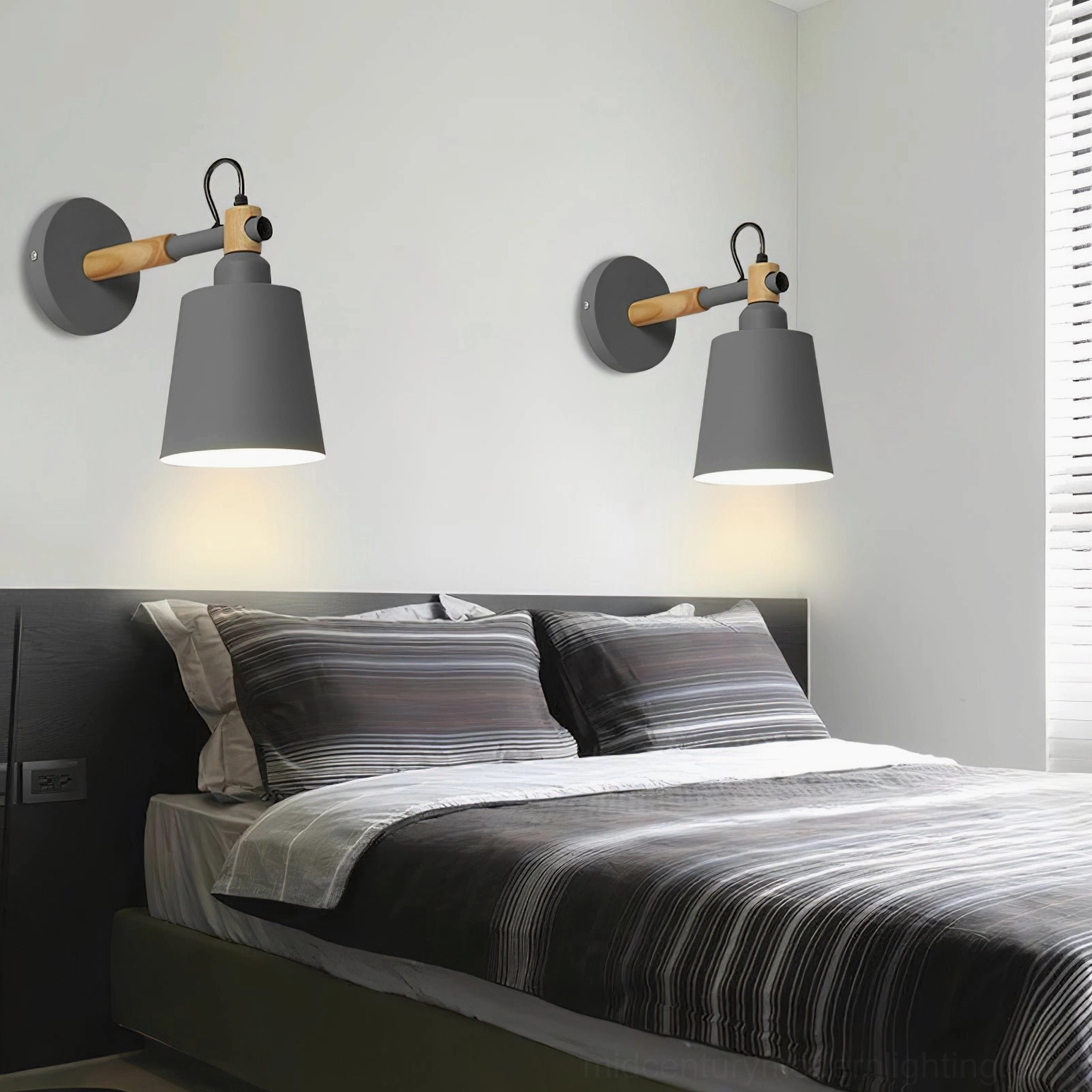 Pair of grey Copita wall lamps installed in modern Nordic bedroom interior with warm ambient lighting