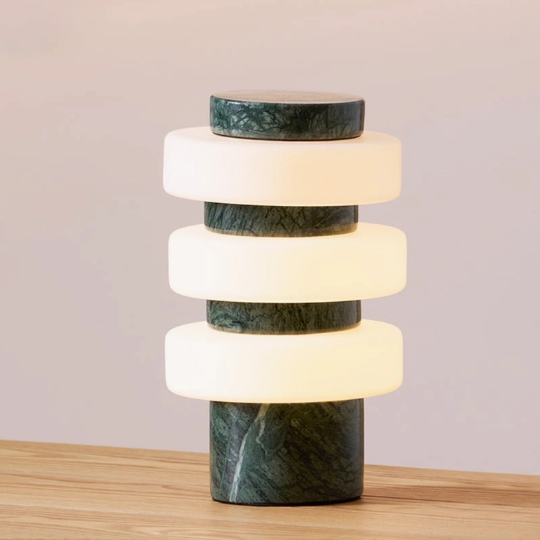 Corba sculptural table lamp with green marble base full view frosted glass stacked rings
