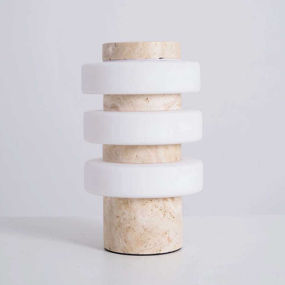 Corba sculptural lamp with natural stone base and layered frosted glass rings design detail