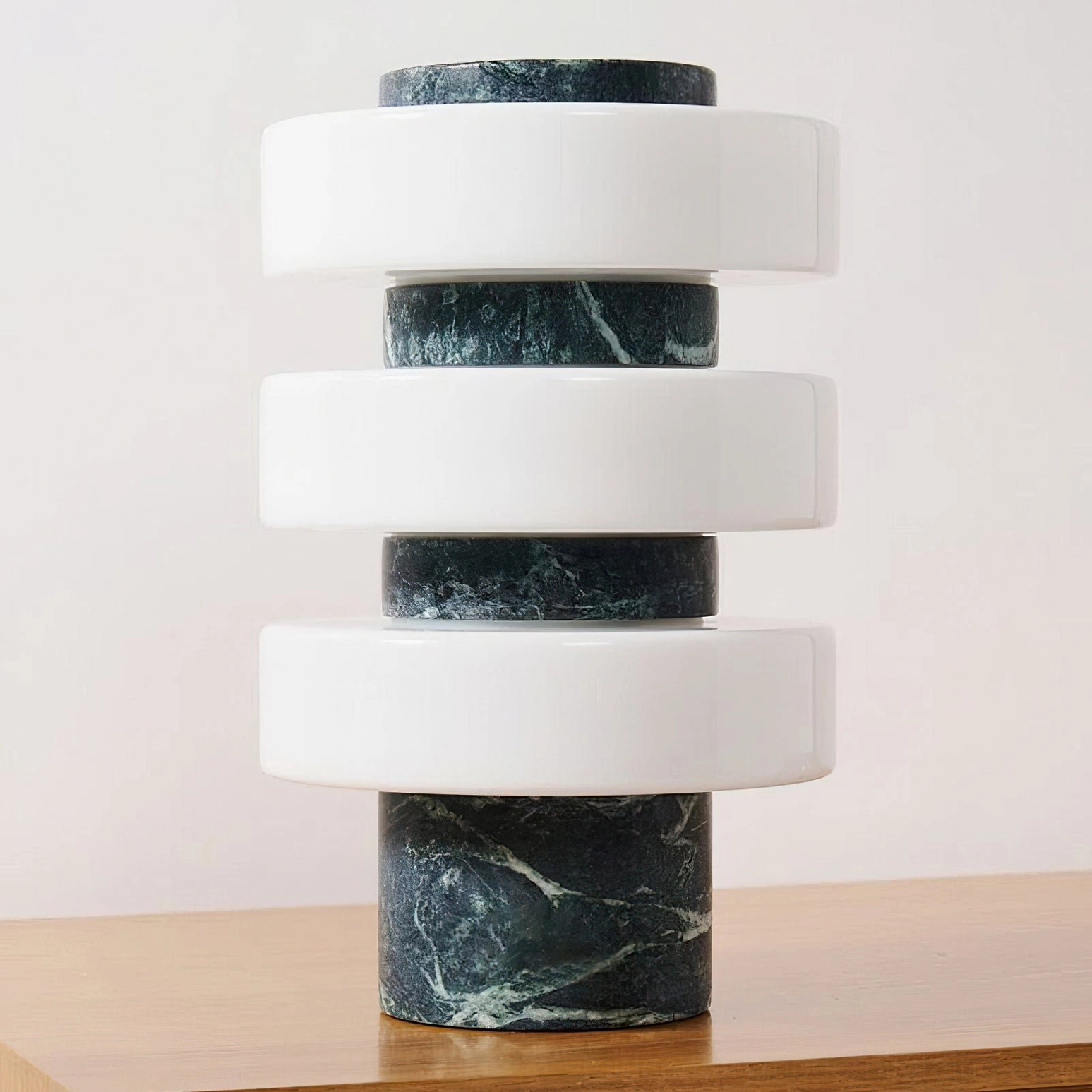 Corba sculptural table lamp with stone base and frosted glass rings contemporary design focus