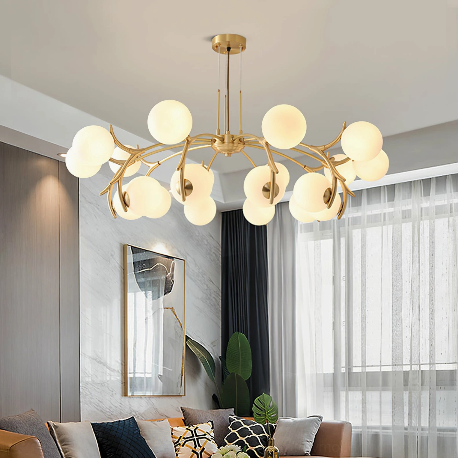 Modern Corbett gold chandelier in neoclassical formal living room with sheer curtains, eye-level angle