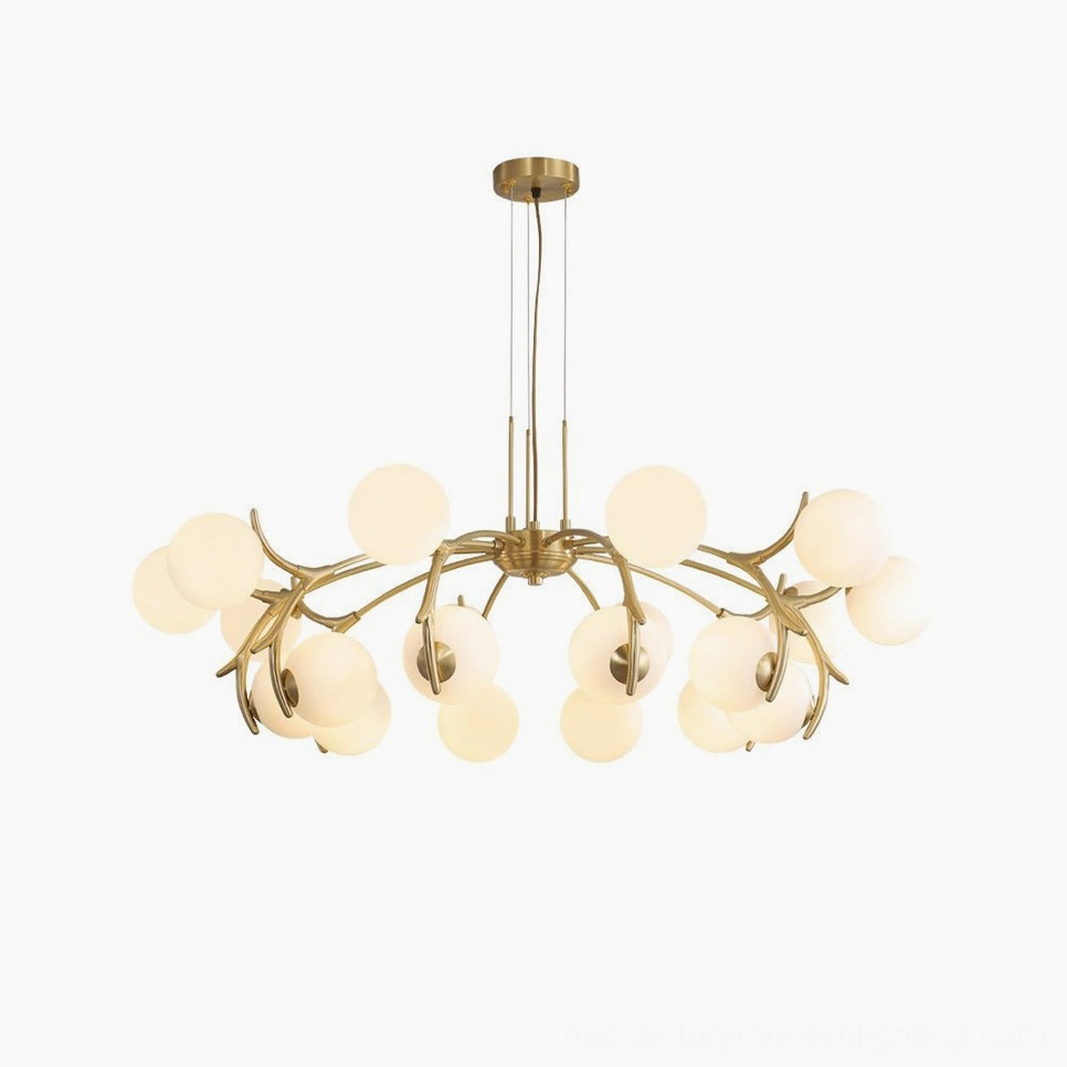 Corbett frosted globe chandelier in warm modern living room with round wall art and elegant decor