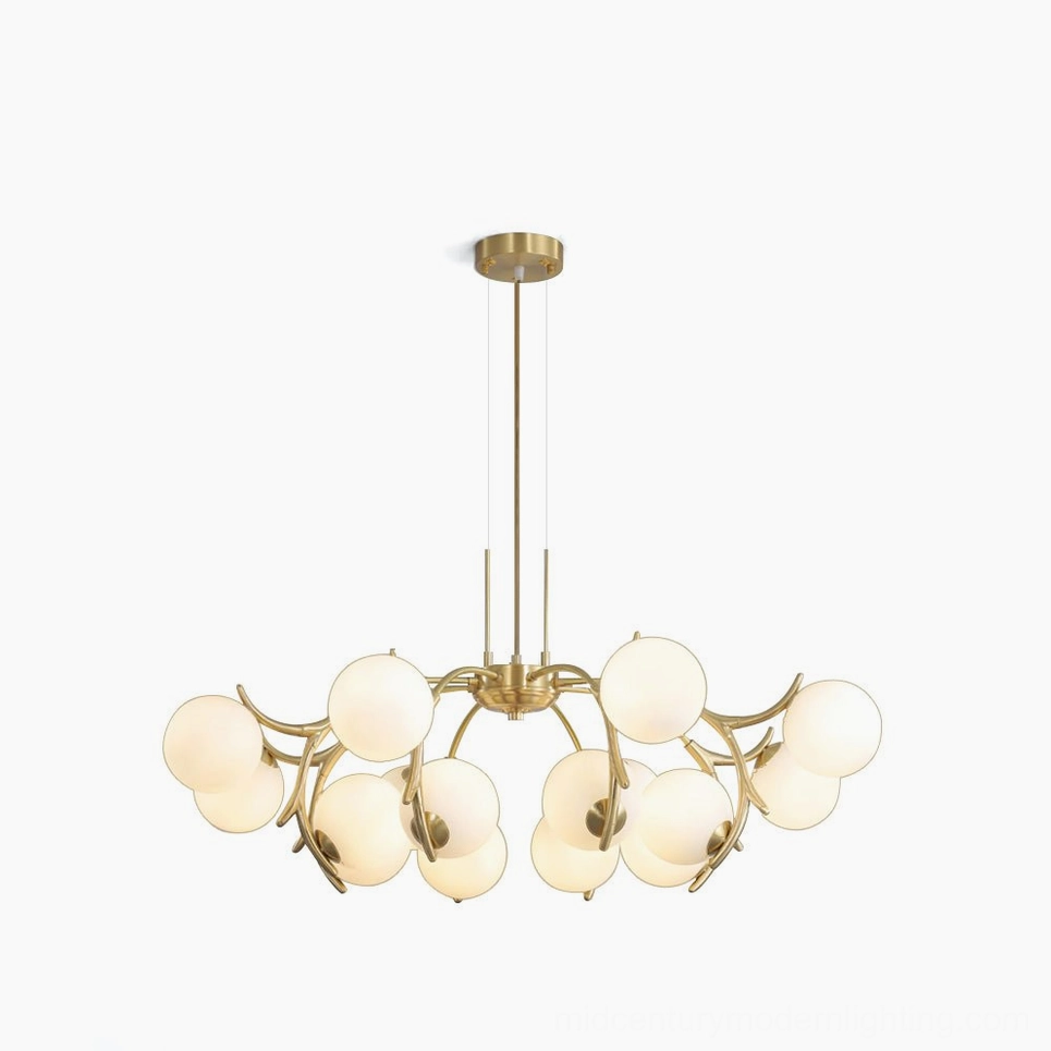 Corbett modern gold chandelier with 10 frosted white glass globe lights, studio overhead view