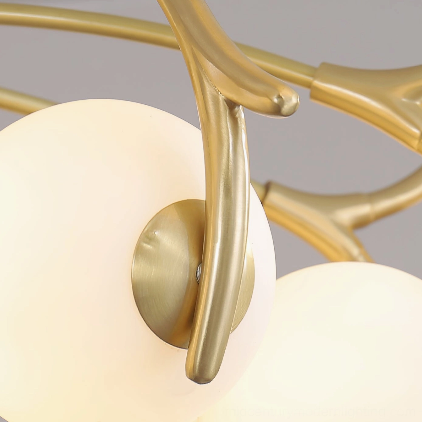 Corbett modern chandelier with curved brass arms, minimalist luxury aesthetic pendant lights