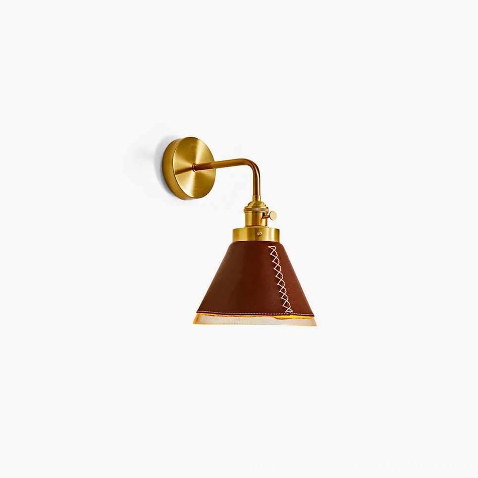 Cordoba wall sconce front view with brass hardware and hand-stitched brown leather shade on white background