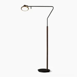 Cos minimalist black floor lamp with adjustable arm and wood pole, front side view on white studio background