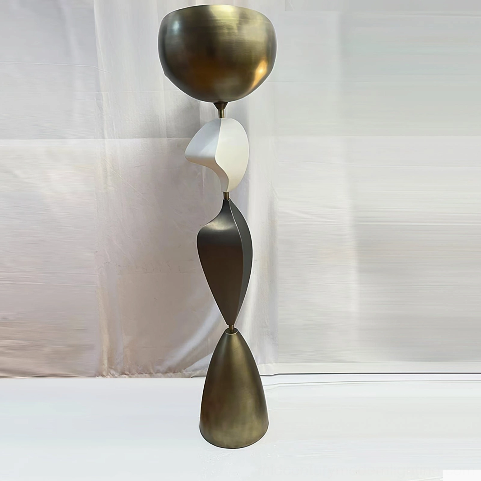 Cosmo bowl shade abstract floor lamp with multi-tone metal finish, asymmetrical stacked design, side view