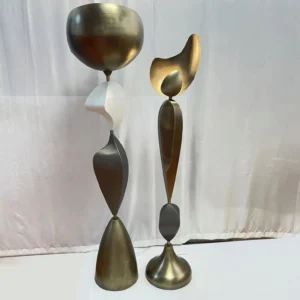 Pair of Cosmo artistic floor lamps with asymmetric organic forms, bronze and black metal, side display