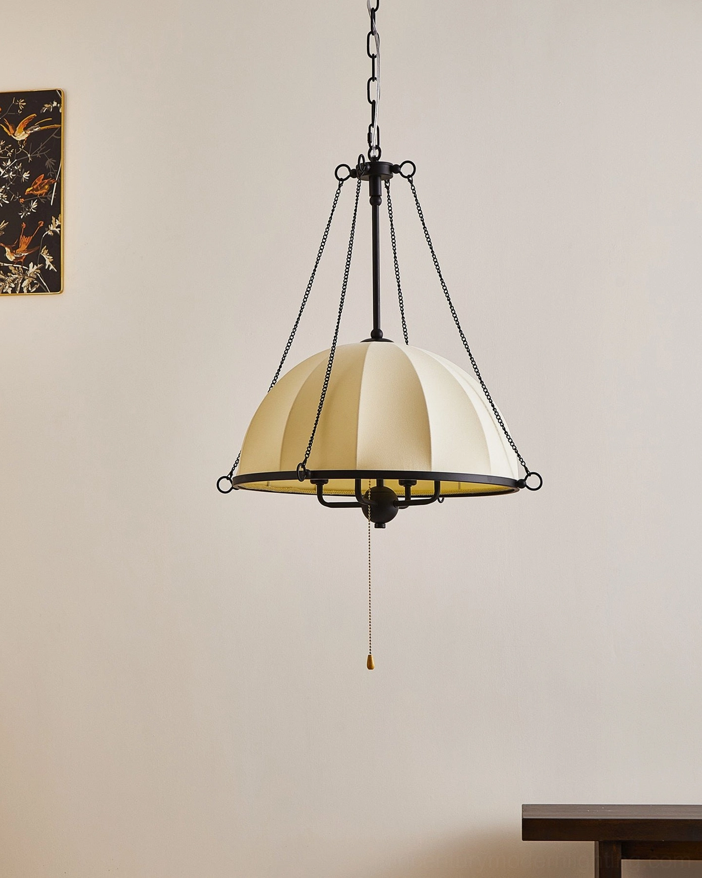 Covina mid-century pendant lamp with off-white ribbed shade and black suspension chains, side angle