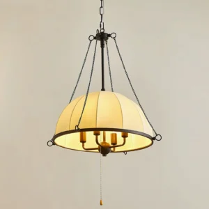 Covina pendant lamp with exposed candle bulbs and two-tone metal finish, warm interior lighting