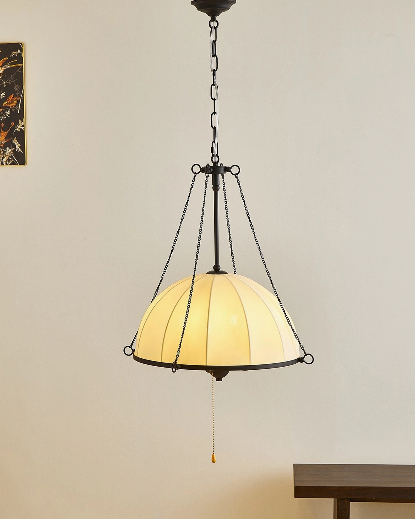 Covina pendant lamp with off-white fabric shade and black metal frame, interior setting