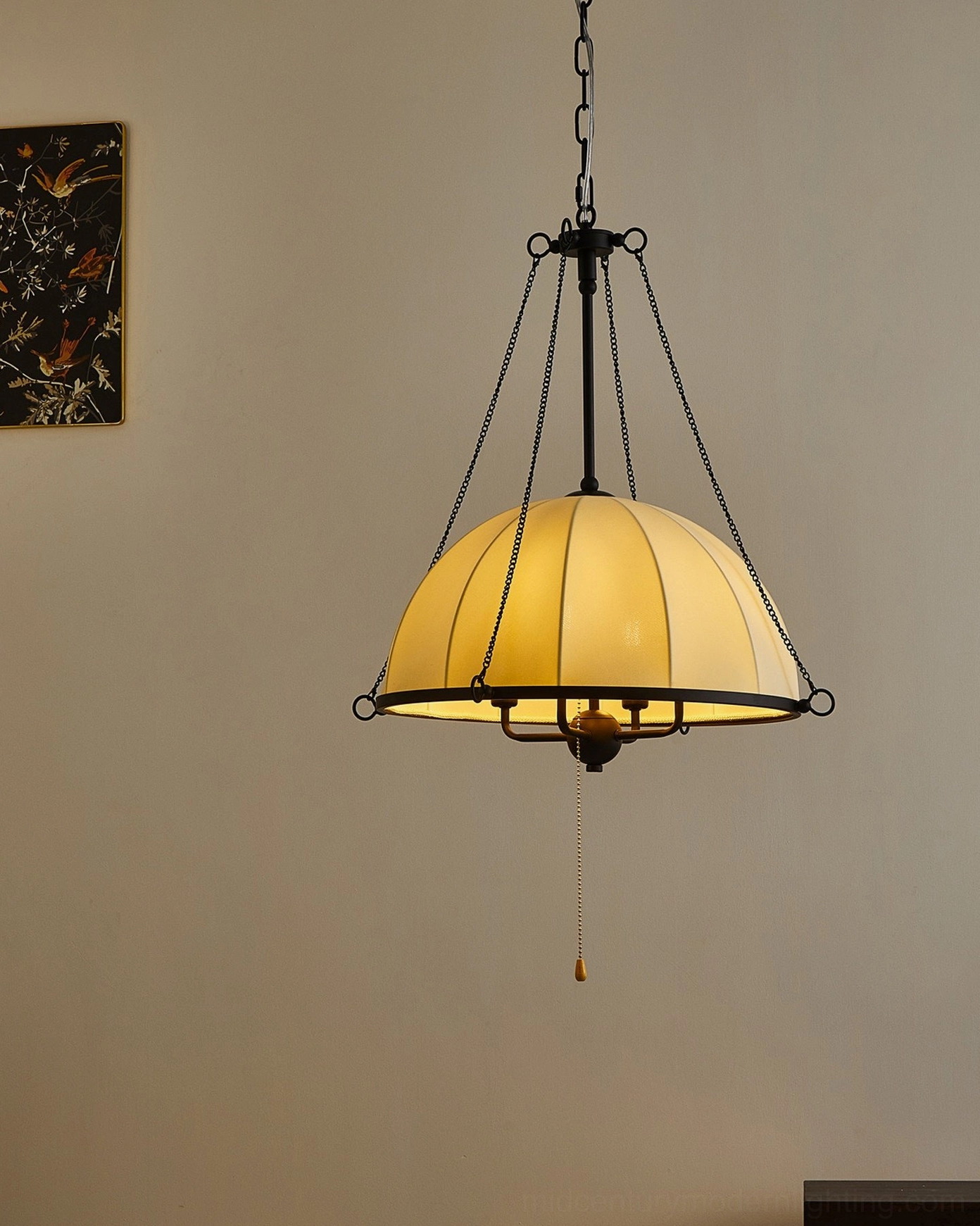 Covina mid-century pendant lamp with warm glowing off-white shade and pull chain control