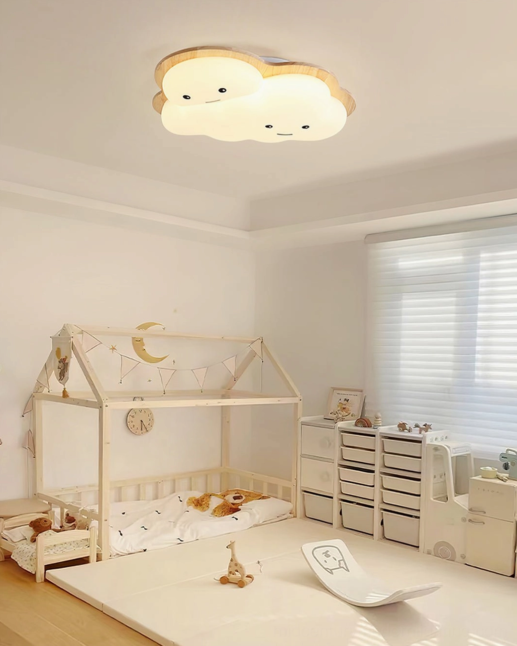 Cozy cloud light fixture in children's bedroom with tent-style bed and soft warm illumination