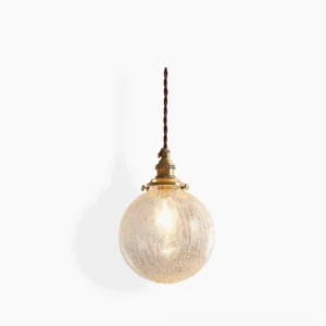 Crackle glass globe pendant light with brass fitting, front view showing textured clear glass and warm LED bulb illumination